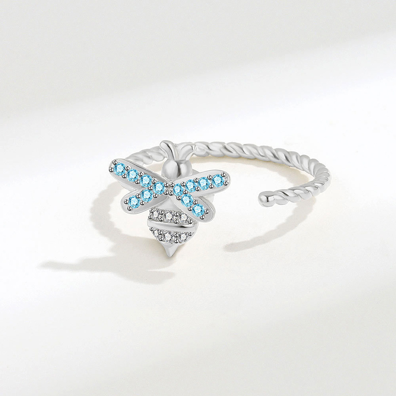 ใหม่แหวนเพชรเทียมสีฟ้าแบบหมุนไ - Street Fashion Rings บทวิจารณ์และราคา